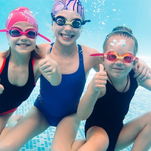 Kids and teens swimming